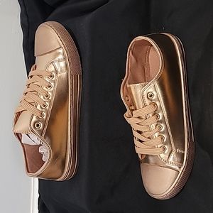 Metallic rose gold low top sneakers